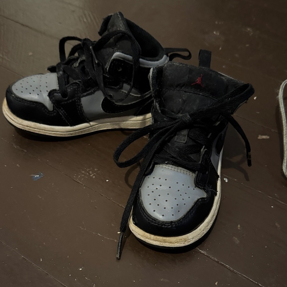 Black and Gray Nike Jordan’s